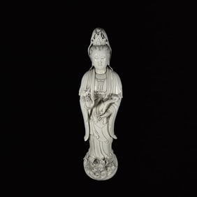 A Solemn Blance-De-Chine Statue of Avalokitesvara