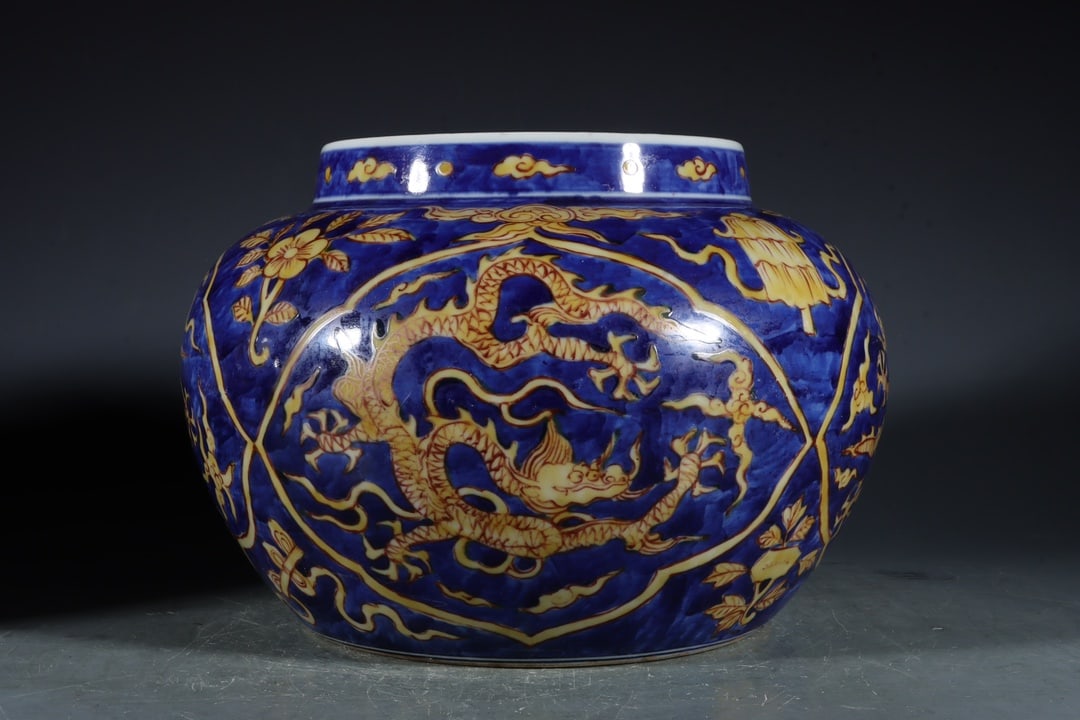 An Exquisite Yellow Ground Blue and White Flower and Dragon Pattern Vat (1 of 7)