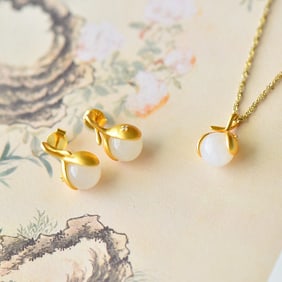 A Set of Fine Sterling Silver-Gold Plated Inlaid White Jade Jewelrys