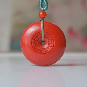 An Exquisite Cinnabar Pendant