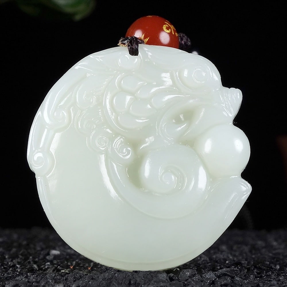 An Exquisite White Jade Auspicious Beast Pendant (1 of 6)