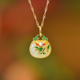 An Exquisite Sterling Silver-Gold Plated Inlaid White Jade Pendant