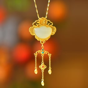 An Exquisite Sterling Silver-Gold Plated Inlaid White Jade Pendant
