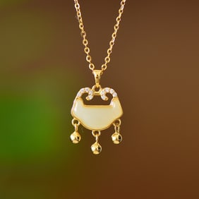 An Exquisite Sterling Silver-Gold Plated Inlaid White Jade Pendant