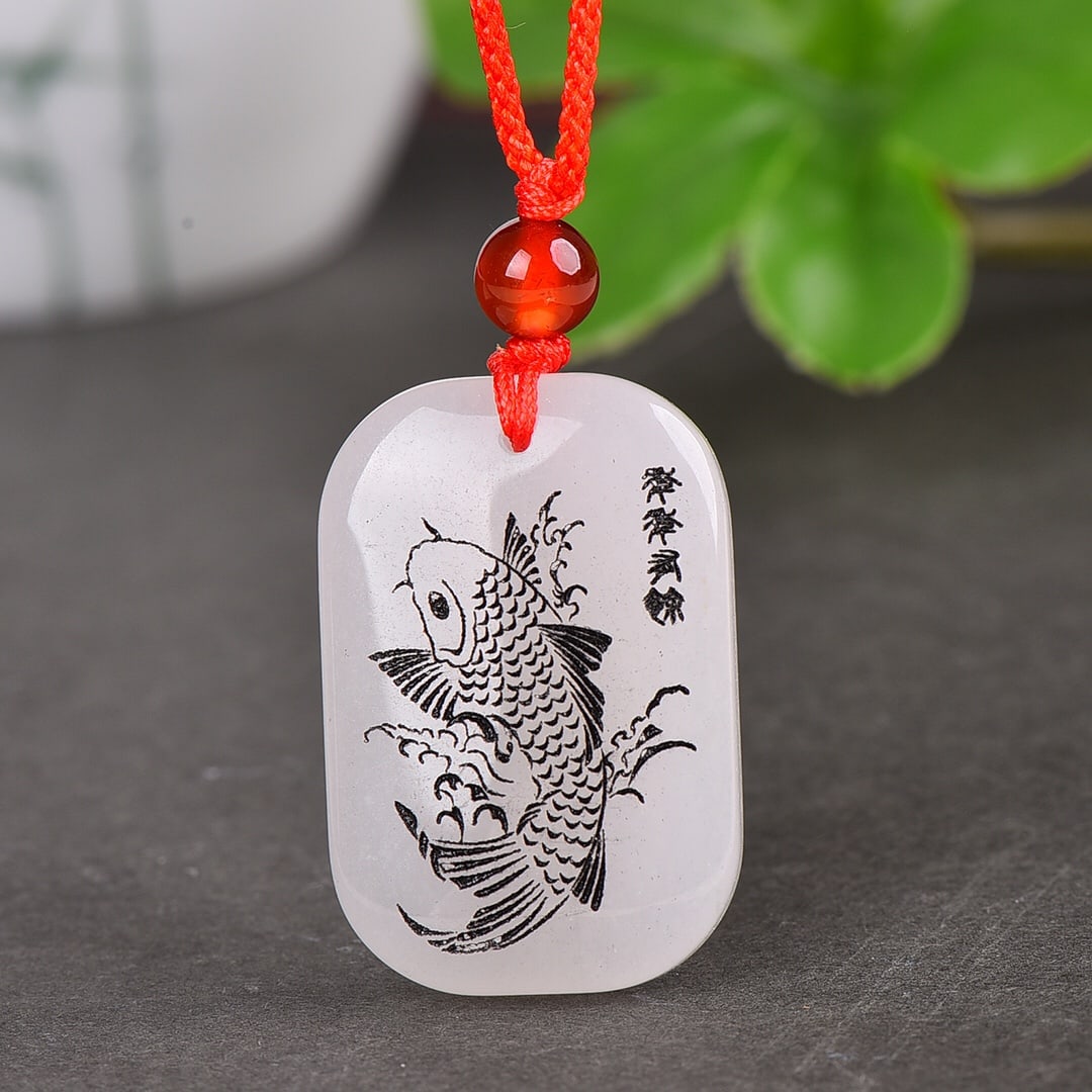An Exquisite White Jade Fish Pattern Pendant: An Exquisite White Jade Fish Pattern Pendant,Size:1.2inx0.8in 白玉鱼纹挂件
