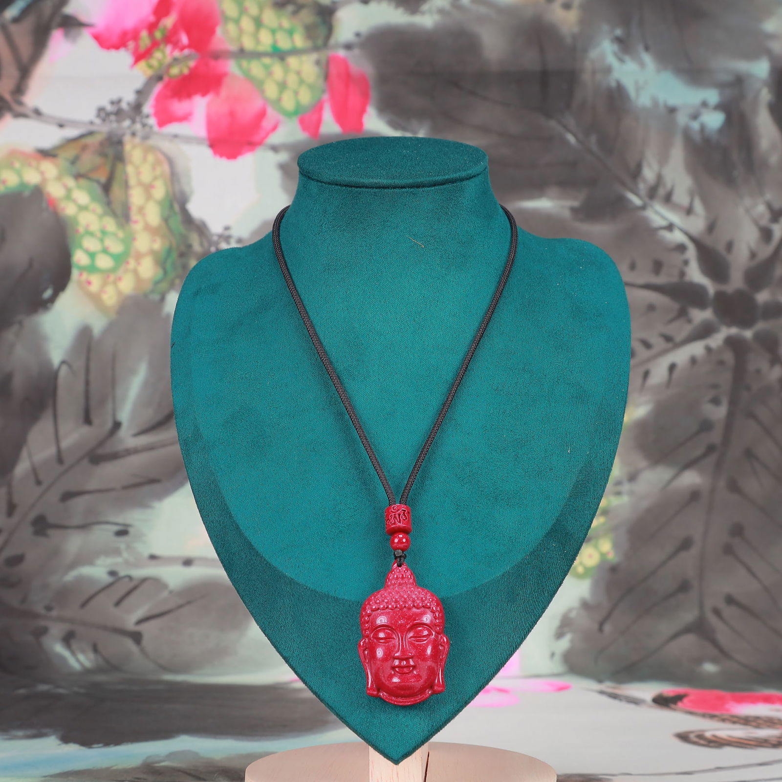 An Exquisite Cinnabar Statue of Sakyamuni Pendant: An Exquisite Cinnabar Statue of Sakyamuni Pendant, Size:1.2inx1.8in, Weight:24g 朱砂释迦牟尼佛像挂件