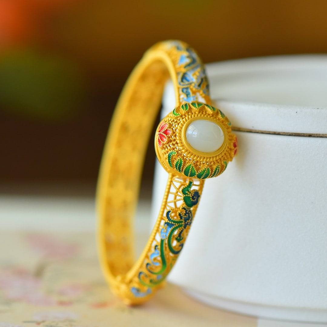 An Exquisite Sterling Silver-Gold Plated Inlaid White Jade Bracelet: An Exquisite Sterling Silver-Gold Plated Inlaid White Jade Bracelet 纯银镀金镶白玉手镯