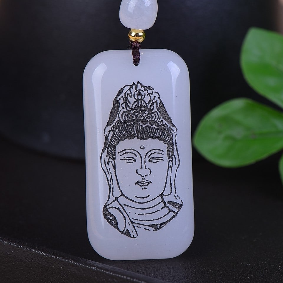 An Exquisite White Jade Statue of Avalokitesvara Pendant: An Exquisite White Jade Statue of Avalokitesvara Pendant,Size:1inx1.9in 白玉观音挂件