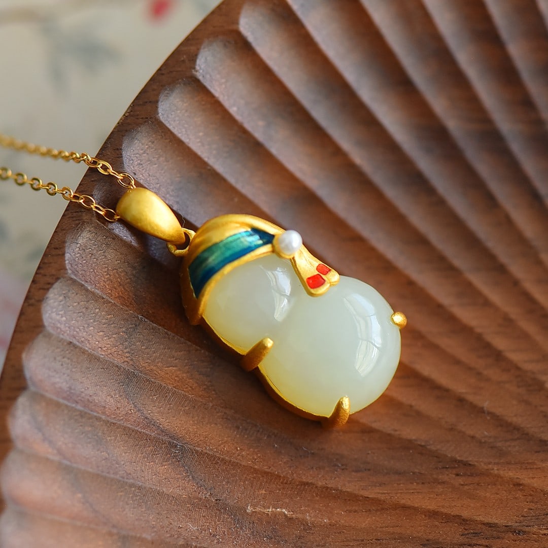 An Exquisite Sterling Silver-Gold Plated Inlaid White Jade Enamel Pendant: An Exquisite Sterling Silver-Gold Plated Inlaid White Jade Enamel Pendant 纯银镀金镶白玉珐琅吊坠
