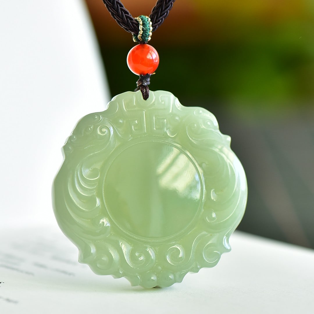 An Exquisite Greenish Jade Dragon Pattern Pendant (1 of 4)