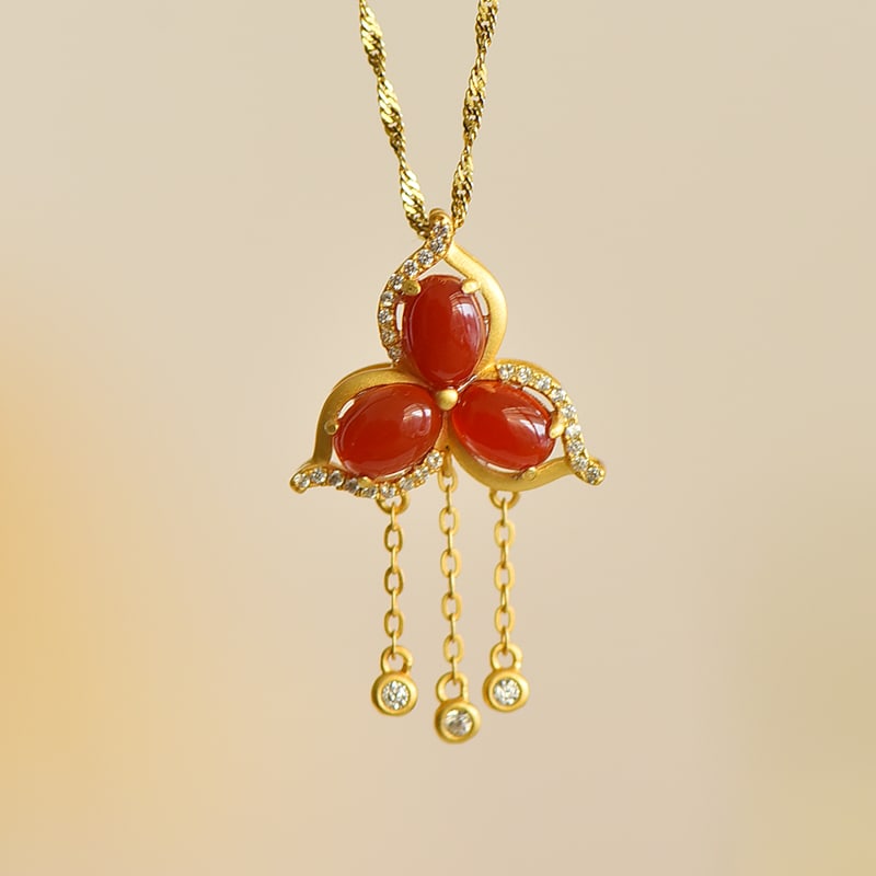 An Exquisite Sterling Silver-Gold Plated Inlaid Agate Pendant: An Exquisite Sterling Silver-Gold Plated Inlaid Agate Pendant,Size:0.2inx0.3in 纯银镀金镶玛瑙吊坠
