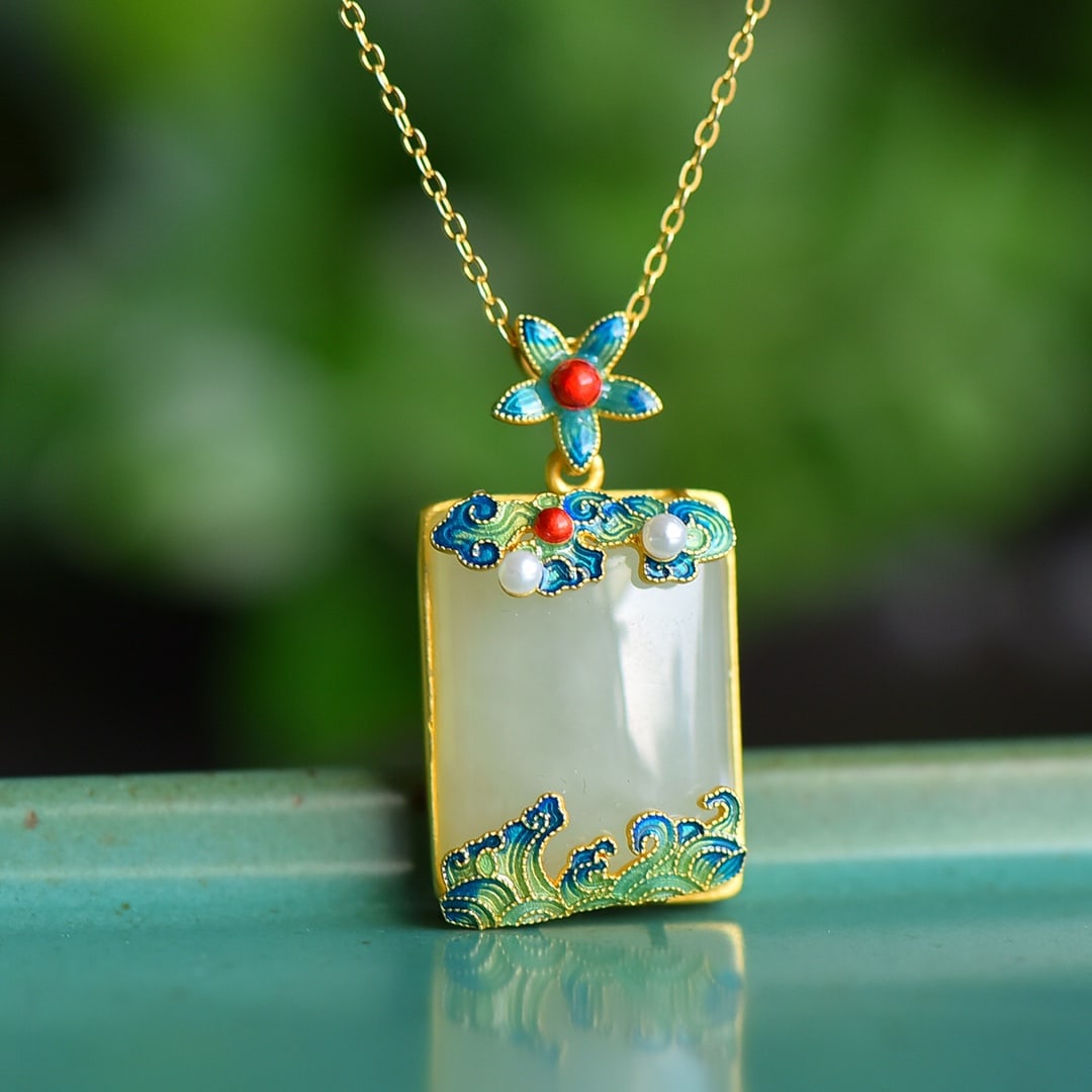 An Exquisite Sterling Silver-Gold Plated Inlaid White Jade Pendant: An Exquisite Sterling Silver-Gold Plated Inlaid White Jade Pendant 纯银镀金镶白玉吊坠