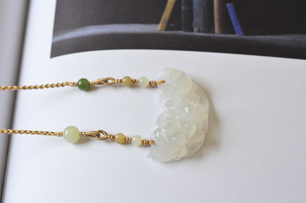 An Exquisite White Jade Lotus Pattern Pendant: An Exquisite White Jade Lotus Pattern Pendant,Size:2inx0.9inx0.4in 白玉莲花挂件
