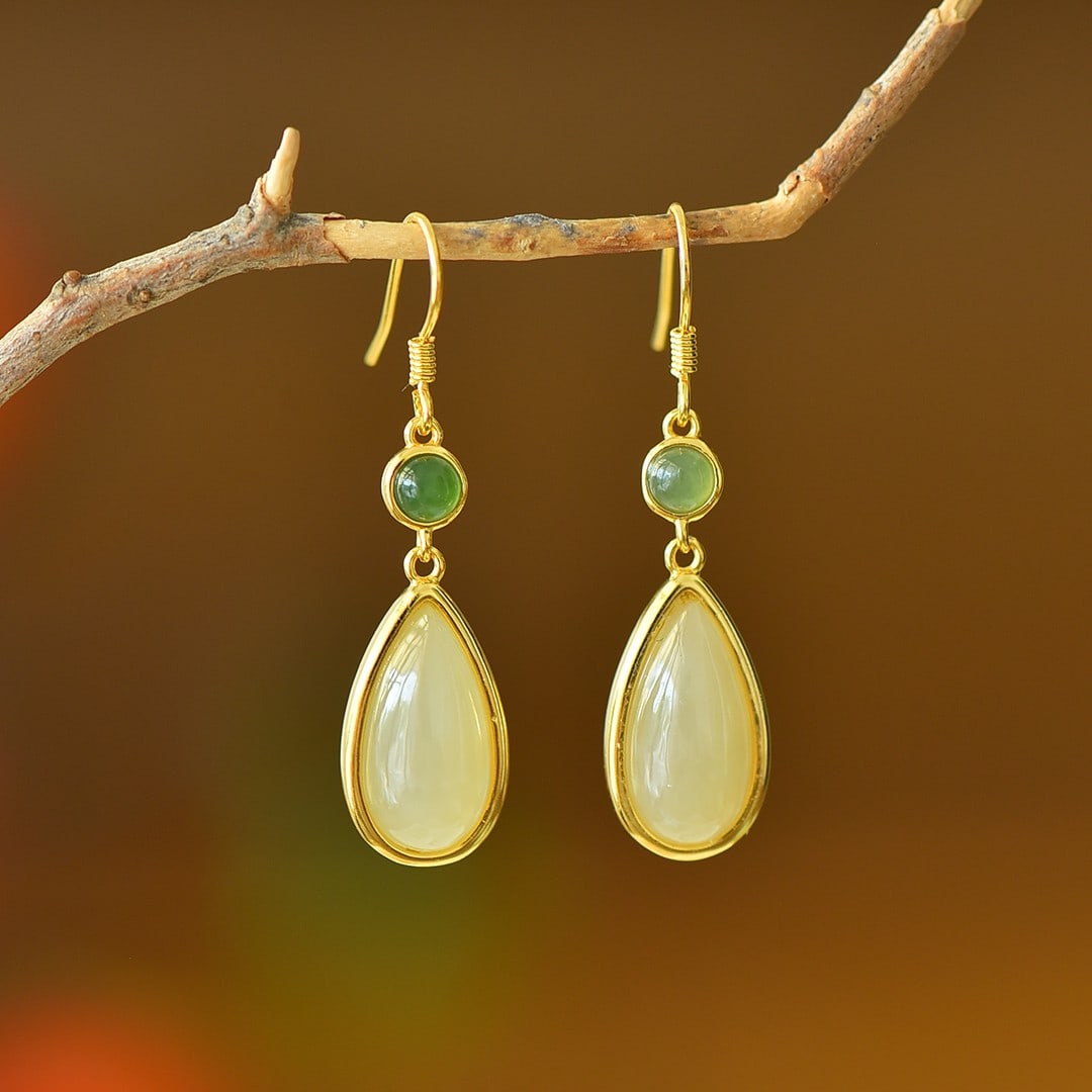 A Pair of Exquisite Sterling Silver-Gold Plated Inlaid White Jade Earrings: A Pair of Exquisite Sterling Silver-Gold Plated Inlaid White Jade Earrings 一对纯银镀金镶白玉耳环