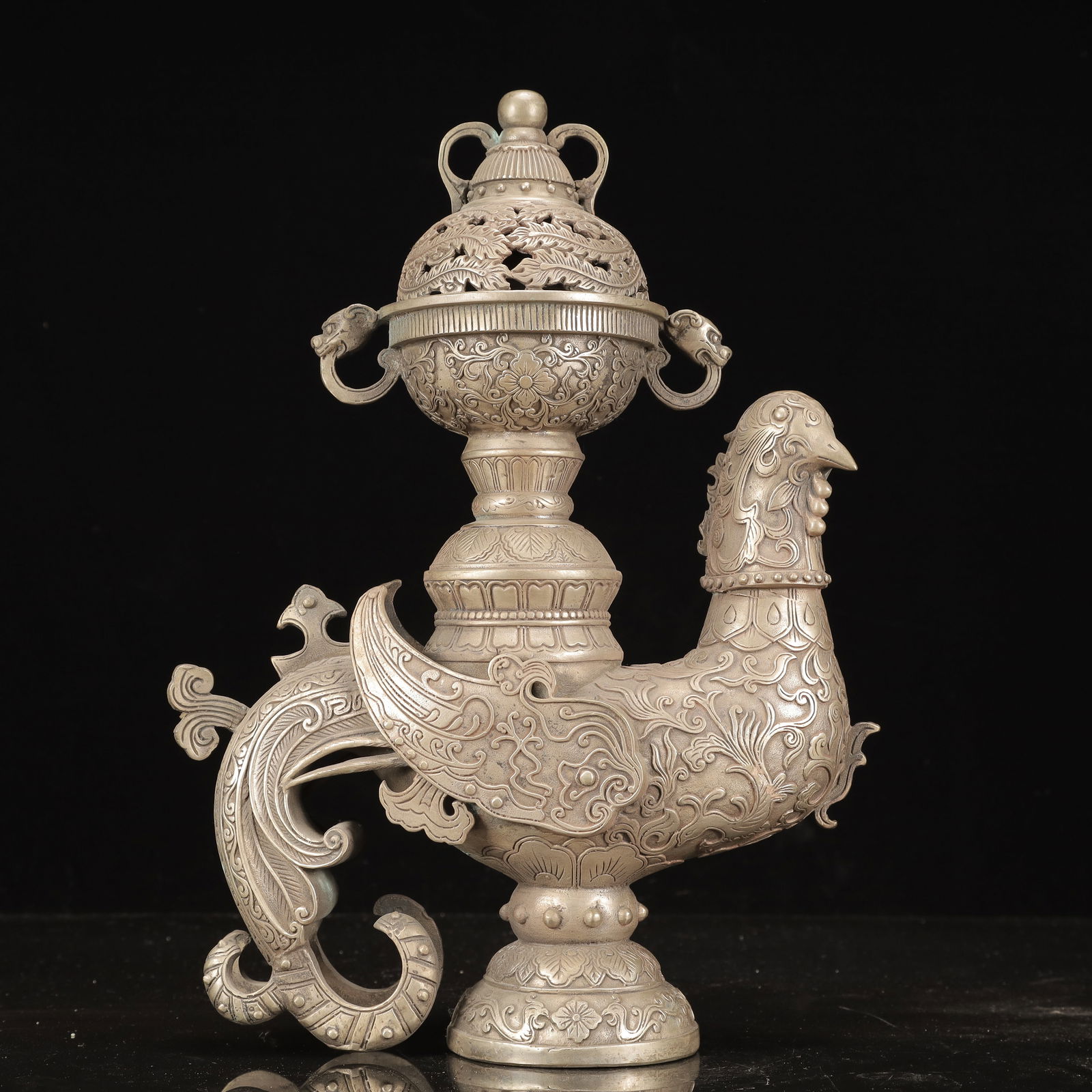 A Rare Silver-plated Copper Flower Pattern Phoenix-Shaped Censer: A Rare Silver-plated Copper Flower Pattern Phoenix-Shaped Censer,Qing Dynasty, China, Qianlong Four-character Mark,Size:11inx4.3inx14.6in,Weight:4300g 铜镀银花卉纹&