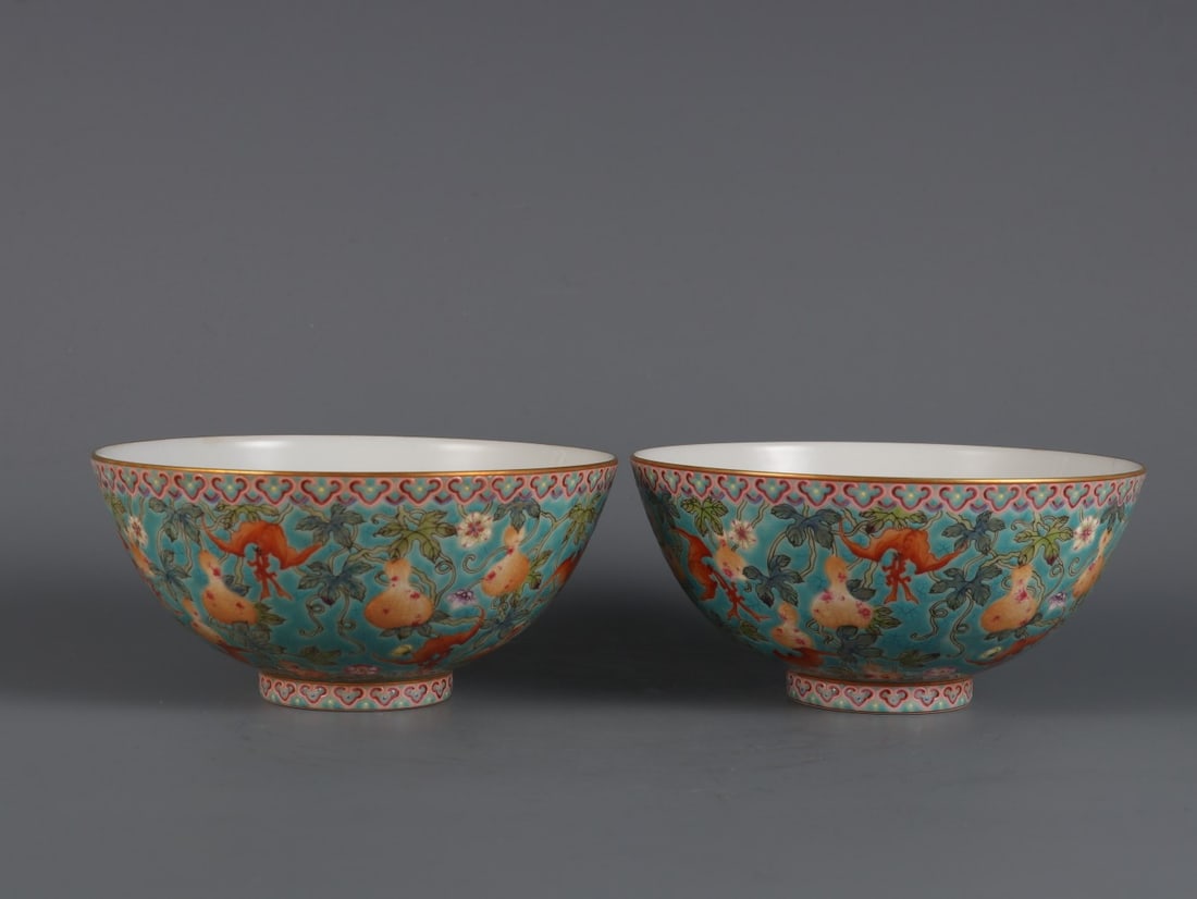 A Pair of Exquisite Turquoise Ground Famille-Rose Painted Gold Bats and Gourd Pattern Bowls