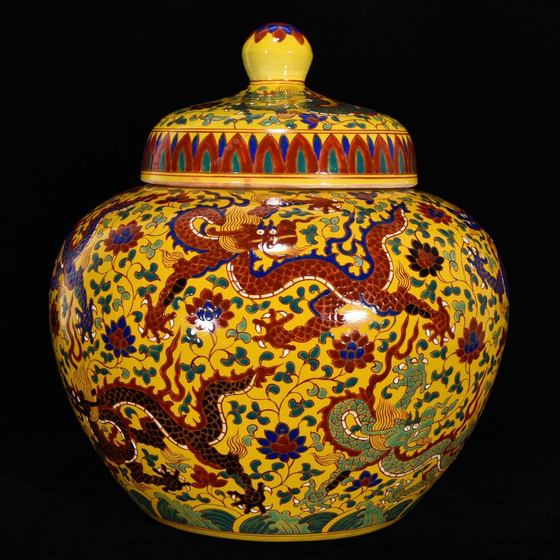 A Rare Yellow Ground Wucai Lotus and Dragon Pattern Cover Jar (1 of 9)
