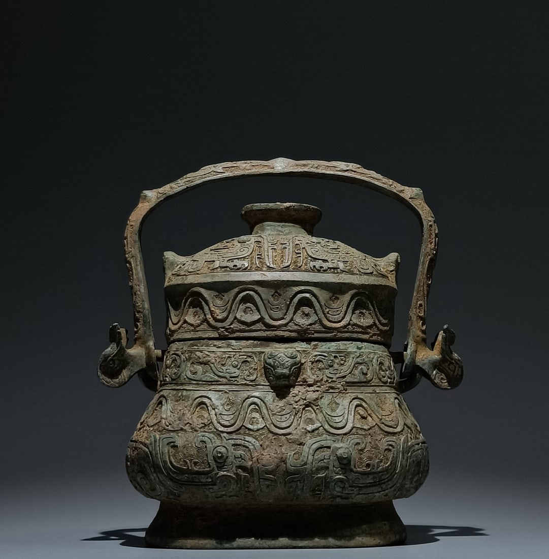 An Archaic Bronze Phoenix Pattern Beast-Ears Ewer (1 of 9)