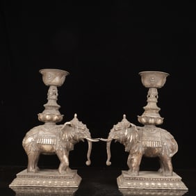 A Pair of Rare Silver Lotus Pattern Elephant Candlesticks