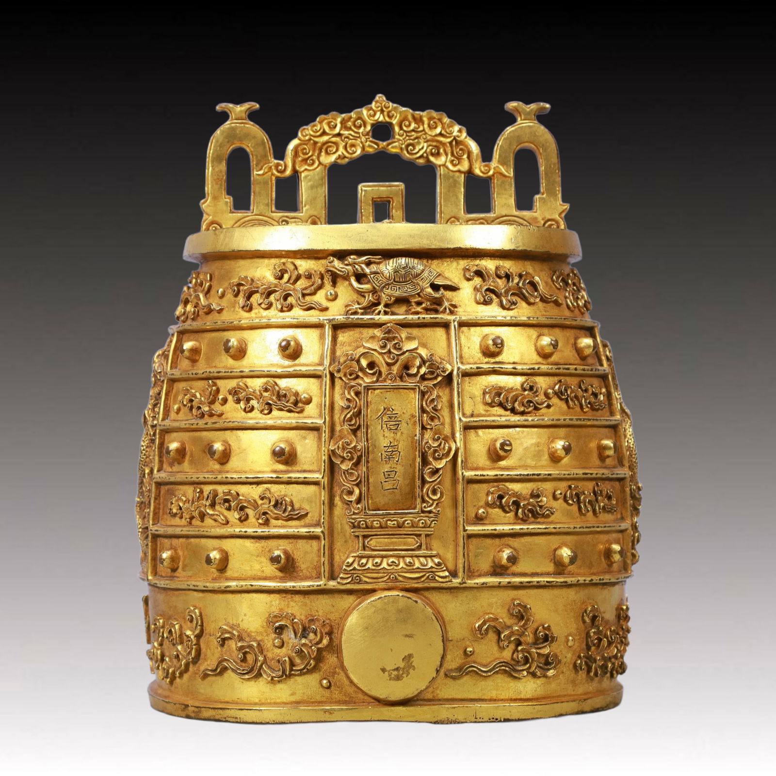 An ExquisiteGilt Bronze Auspicious Cloud and Dragon Pattern Chime: An ExquisiteGilt Bronze Auspicious Cloud and Dragon Pattern Chime,Ming Dynasty, China,Size:8.7inx7.1inx10.2in Weight:11300g 铜鎏金祥云龙纹编钟,