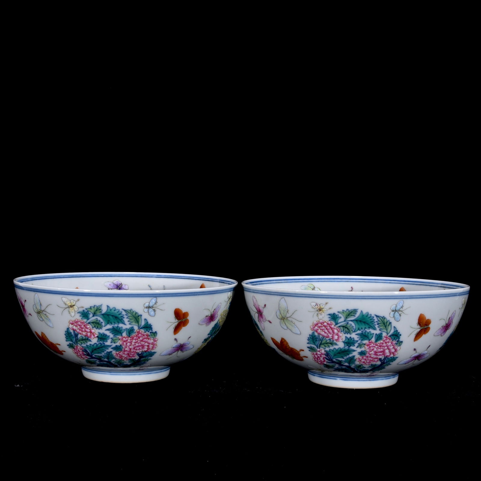 A Pair of Exquisite Blue and White Doucai Flower and Butterfly Pattern Bowls: A Pair of Exquisite Blue and White Doucai Flower and Butterfly Pattern Bowls,Qing Dynasty, China,Qianlong Six-character Mark,Size:6.5cmx15cm 