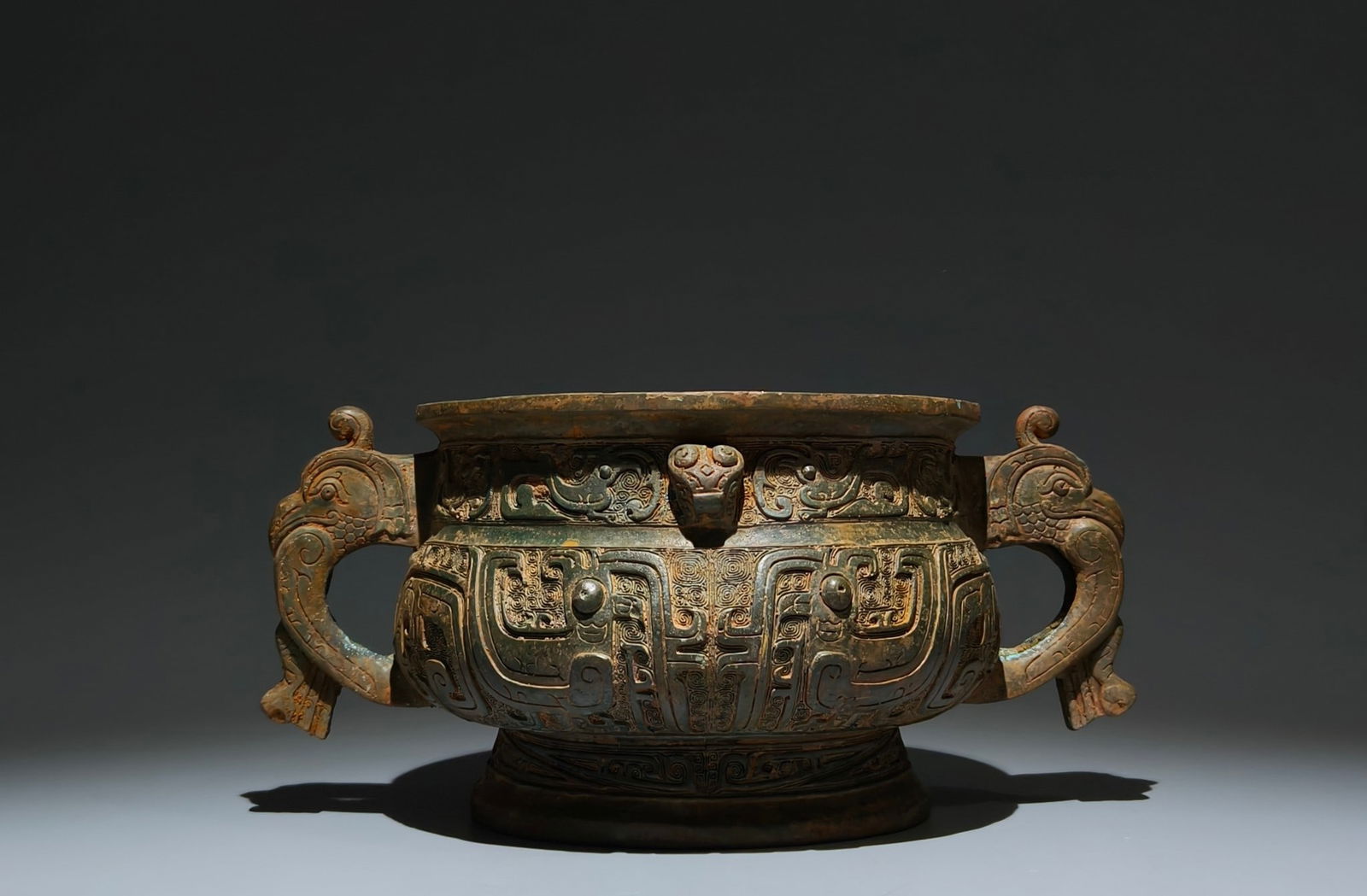 An Archaic Bronze Beast-Face Pattern Beast-Ears Food Vessel: An Archaic Bronze Beast-Face Pattern Beast-Ears Food Vessel,the Western Zhou Dynasty in China,Size:15cmx31cmx21cm 