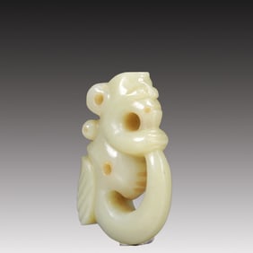 A Rare White Jade Auspicious Beast Ornament