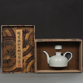 An Exquisite White Glazed Ewer