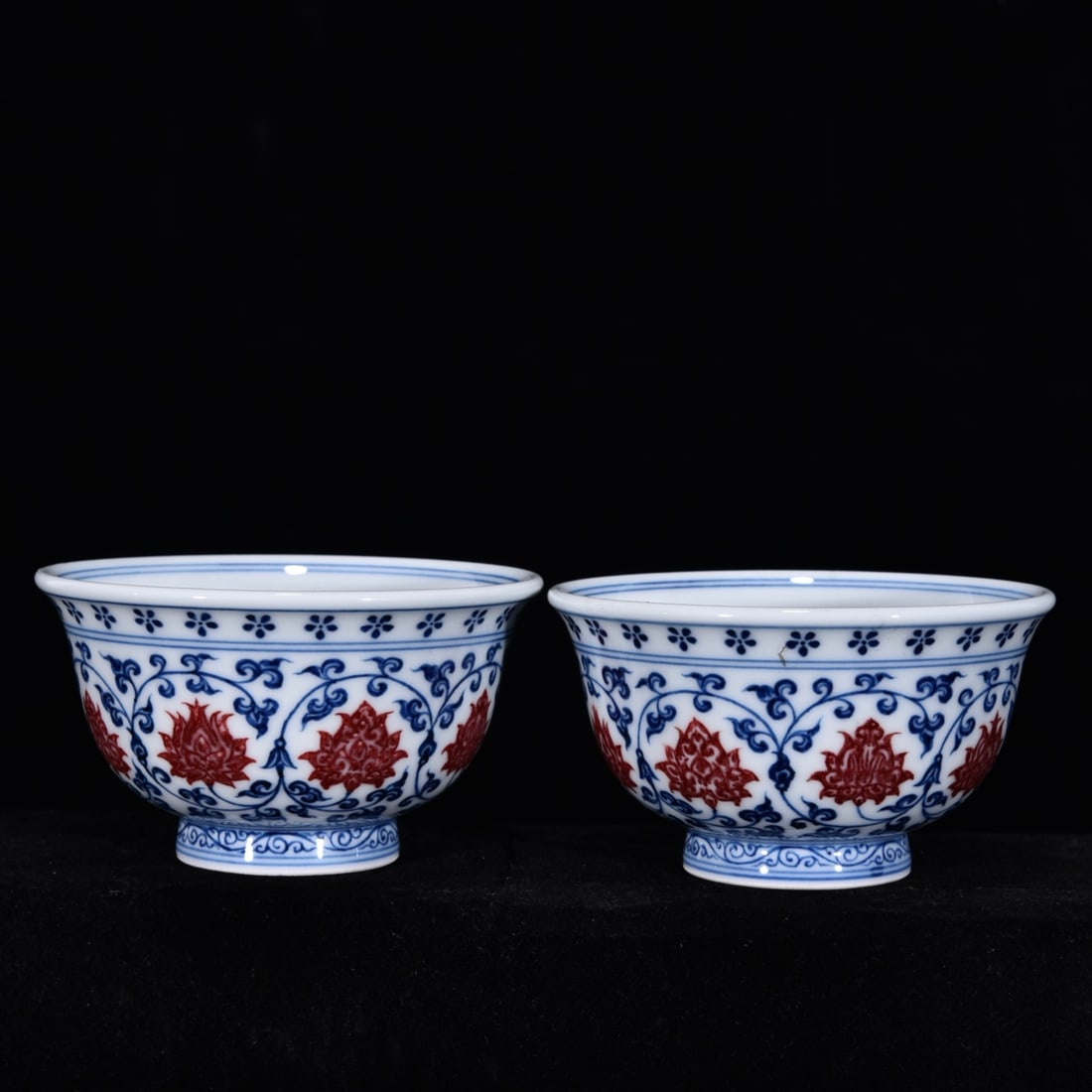 A Pair of Exquisite Blue and White Underglaze-Red Lotus and Lion Pattern Cups (1 of 9)