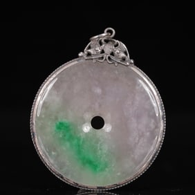 An Exquisite Silver Inlaid Jadeite Pendant