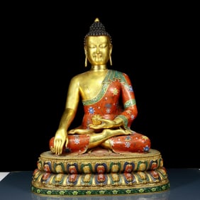A solemn cloisonné statue of Gautama Buddha
