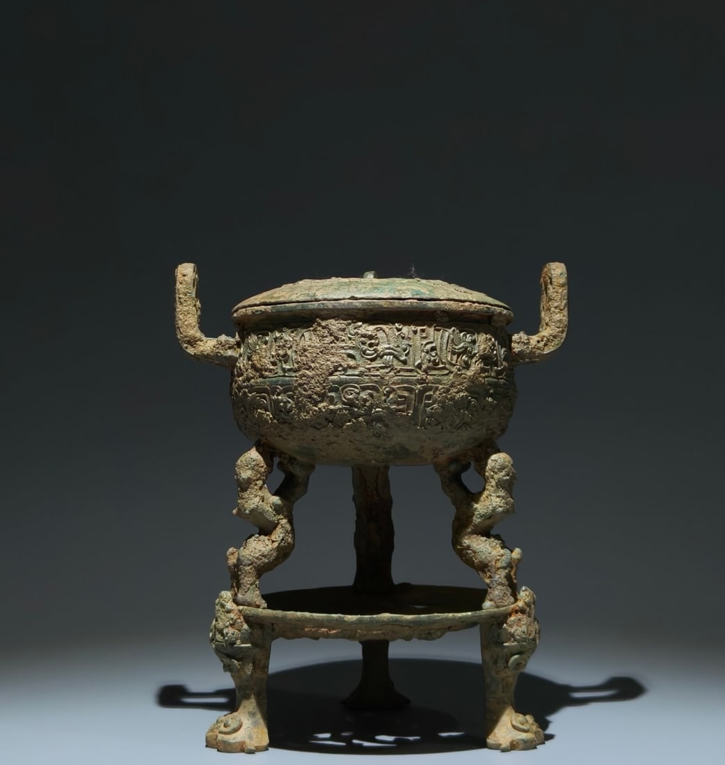 An Archaic Bronze Chi-Dragon Pattern Double-Ears and Tripod Food Vessel,With Tripod Base,With Base (1 of 9)