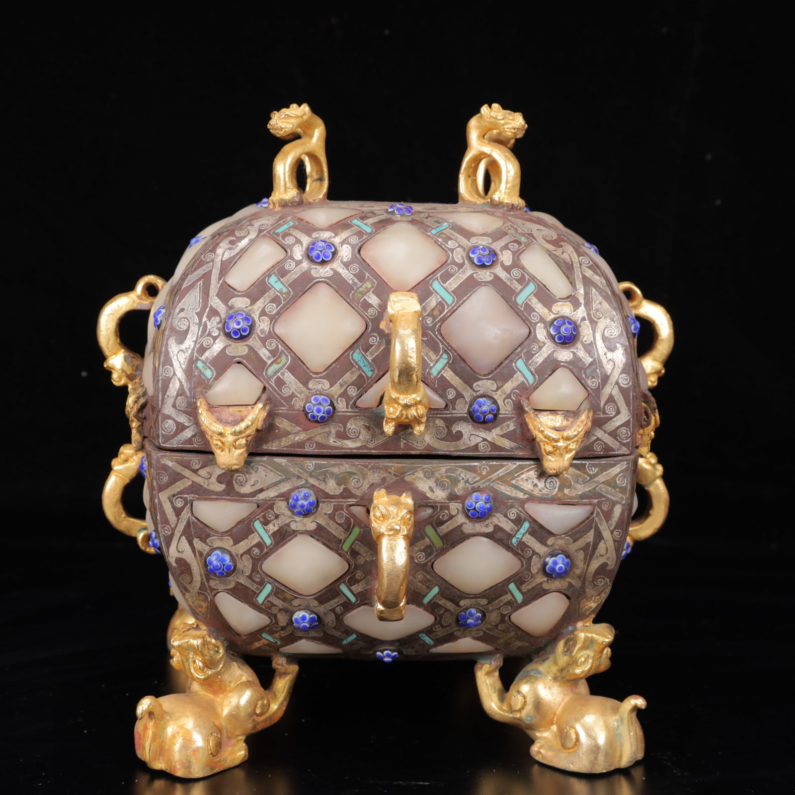 An Archaic Bronze Inlaid Gold and Silver Dragon Pattern Double-Ears Censer,Inlaid Gems: An Archaic Bronze Inlaid Gold and Silver Dragon Pattern Double-Ears Censer,Inlaid Gems,The Warring States period in China,Size:8.3inx7.1inx8.7in,Weight:3600g 