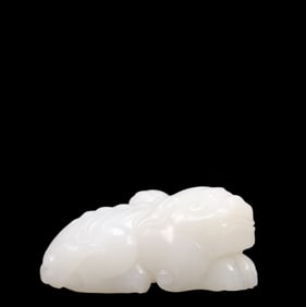 An Exquisite White Jade Lion Ornament