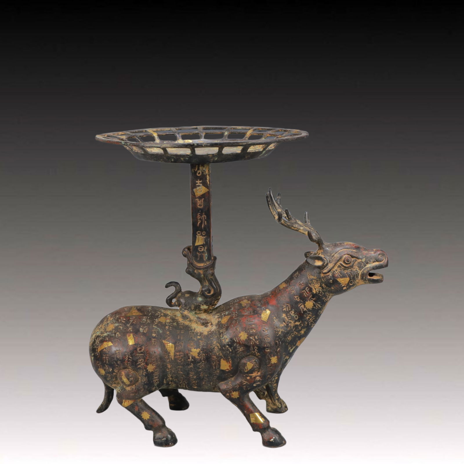 A Rare Bronze Inlaid Gold Sika Deer Candlestick,With Inscription: A Rare Bronze Inlaid Gold Sika Deer Candlestick,With Inscription,Ancient Time, China,Size:13.6inx9.1inx13.9in,Weight:4050g 铜错金梅花鹿烛台,带&