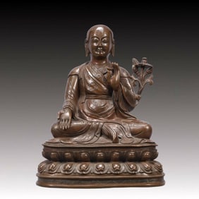 A Solemn Bronze Statue of Guru