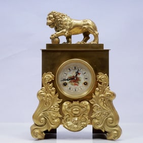 An Exquisite Gilt Bronze Flower Pattern Lion Table Clock Ornament