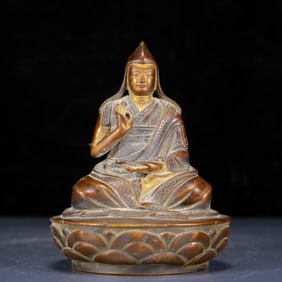 A Solemn Bronze Statue of Guru