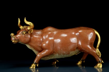 An exquisite cloisonné cow ornament
