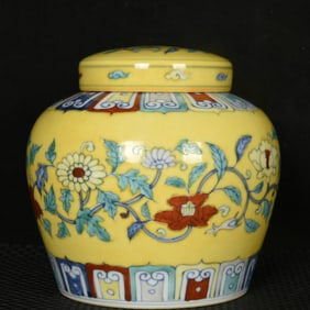 An Exquisite Yellow Ground Doucai Flower Pattern Cover Jar