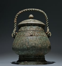 An Archaic Bronze Phoenix Pattern Ewer