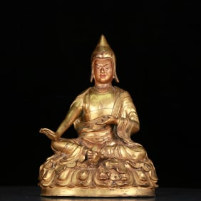 An Elaborate Gilt-Bronze Figure Of Mahasiddha
