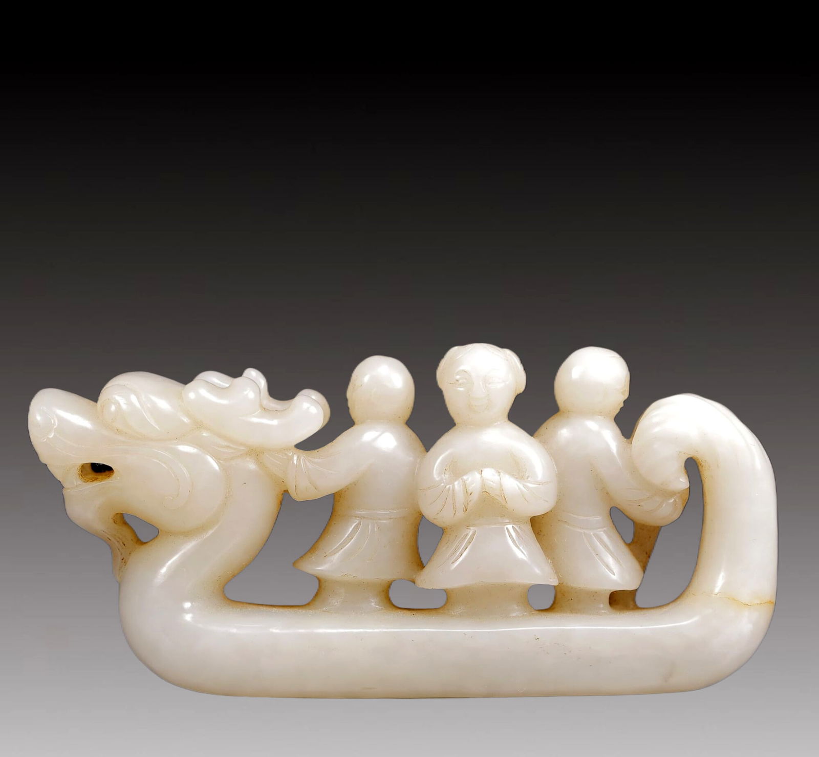An Exquisite White Jade Dragon-Boat Ornament: An Exquisite White Jade Dragon-Boat Ornament,Qing Dynasty, China,Size:4.7inx1inx2.4in,Weight:255g 白玉龙船摆件，清代