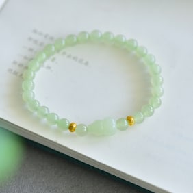 An Exquisite Greenish Jade Bracelets