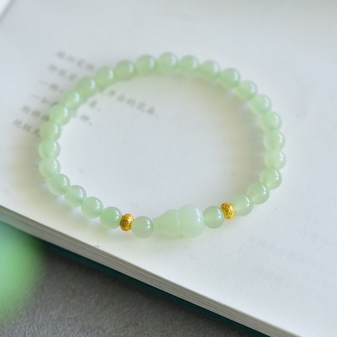 An Exquisite Greenish Jade Bracelets: An Exquisite Greenish Jade Bracelets,Size:6mm 
