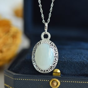 An Exquisite Sterling Silver Inlaid White Jade Pendant
