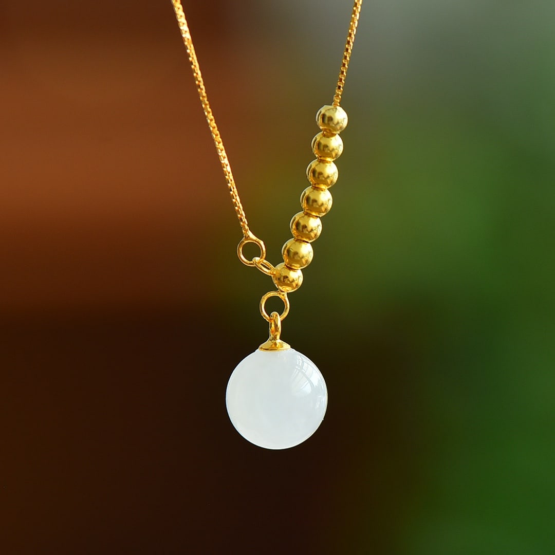 An Exquisite Sterling Silver-Gold Plated Inlaid White Jade Pendant: An Exquisite Sterling Silver-Gold Plated Inlaid White Jade Pendant,Size:10x10mm 纯银镀金镶白玉吊坠