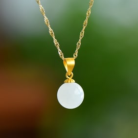 An Exquisite Sterling Silver-Gold Plated Inlaid White Jade Pendant