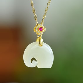 An Exquisite Sterling Silver-Gold Plated Inlaid White Jade Pendant