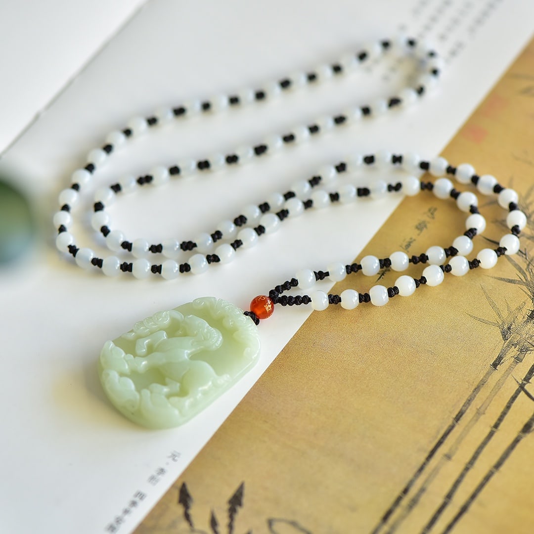 An Exquisite White Jade Sheep Pattern Pendant: An Exquisite White Jade Sheep Pattern Pendant,Size:50mmx30mm 白玉羊纹吊坠